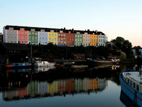Bristol colourful harbourside houses along the river at sunset